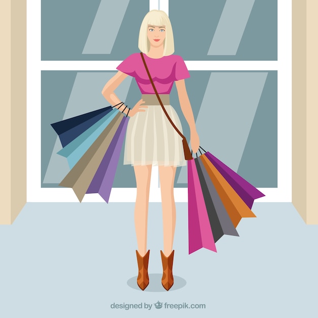 Mujer rubia con bolsas de compras
