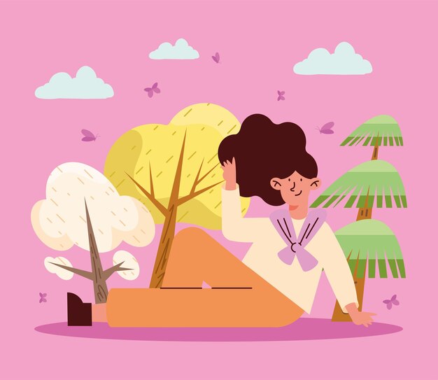 Mujer sentada en el bosque de primavera