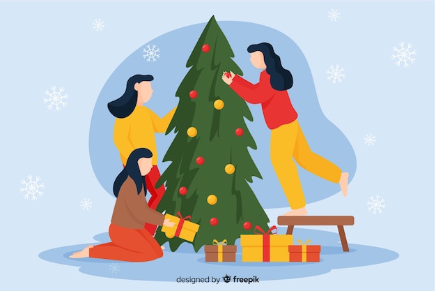 Mujeres decorando el árbol de navidad