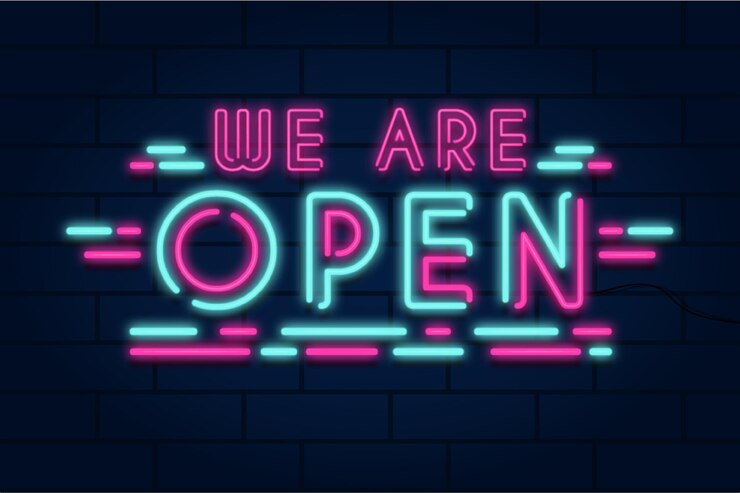 Vector gratuito neón estamos abiertos letrero