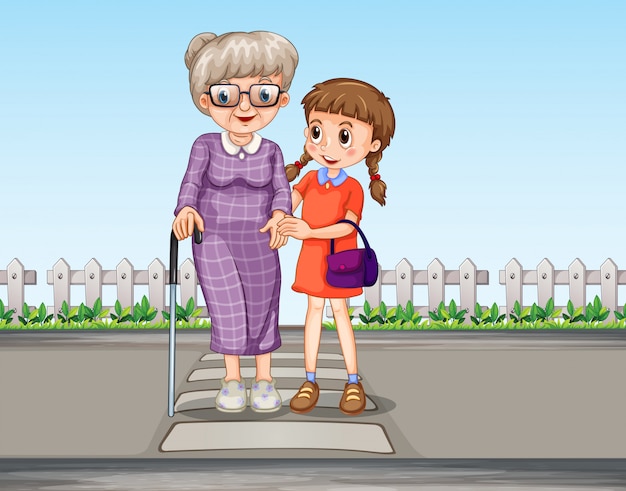 Una niña ayudando a la abuela cruzando la calle.