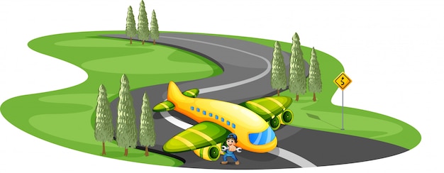 Un niño con un avión aterrizando en el largo y sinuoso camino