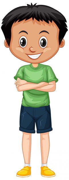 Niño en camisa verde de pie aislado