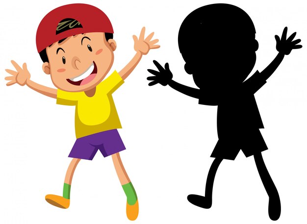 Niño feliz bailando con su silueta