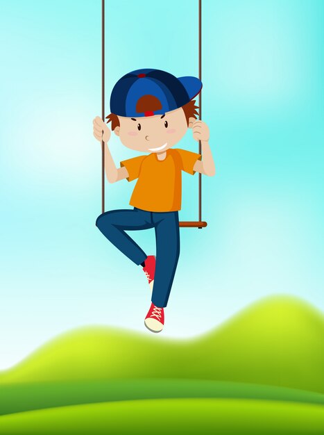 Un niño jugando en columpio