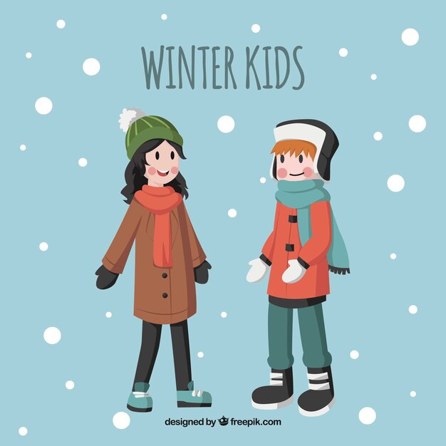 Un niño y una niña caminando en la nieve