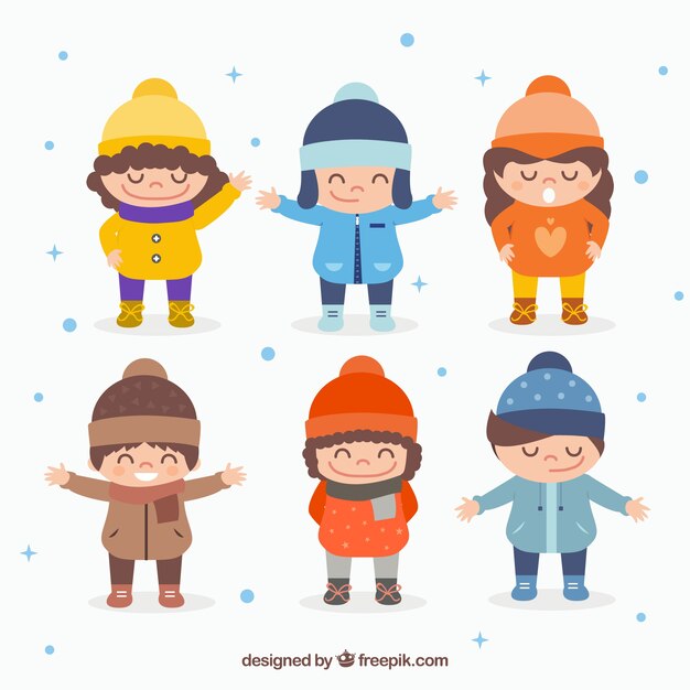 Niños lindos en ropa de invierno