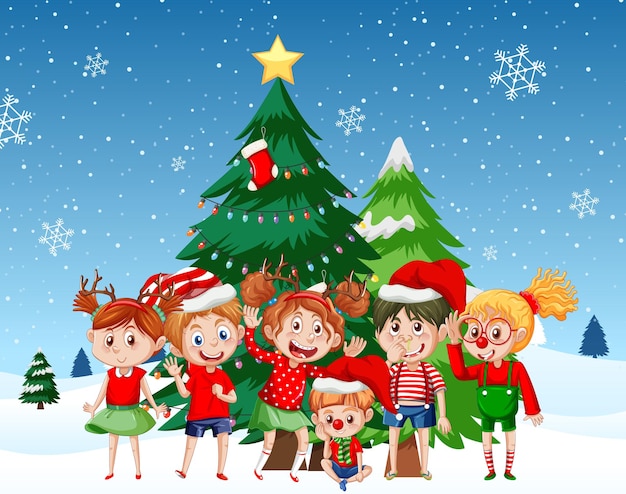 Niños en trajes de Navidad con árbol de Navidad