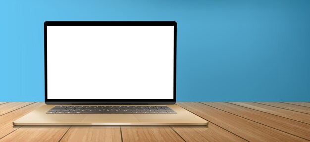 Ordenador portátil con pantalla en blanco sobre mesa de madera