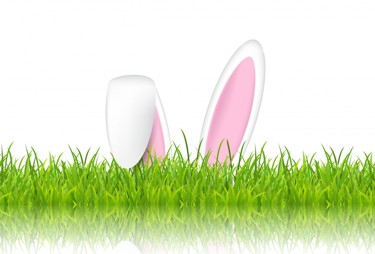 Vector gratuito orejas de conejo de pascua en pasto