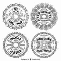 Vector gratuito pack de cuatro insignias circulares de bici dibujadas a mano