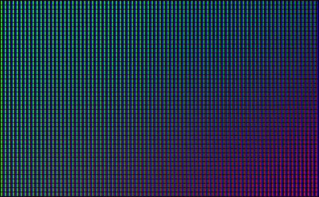 Pantalla de video de pared con luces de punto verde, azul y rojo sobre fondo negro.