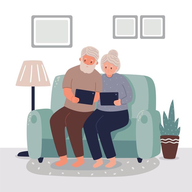 Pareja de ancianos usando tablas digitales