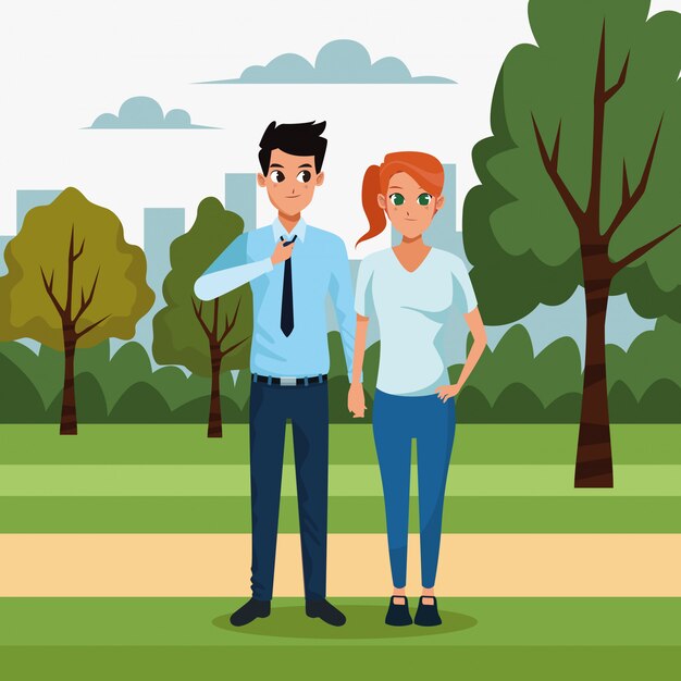 Pareja joven en el paisaje del parque