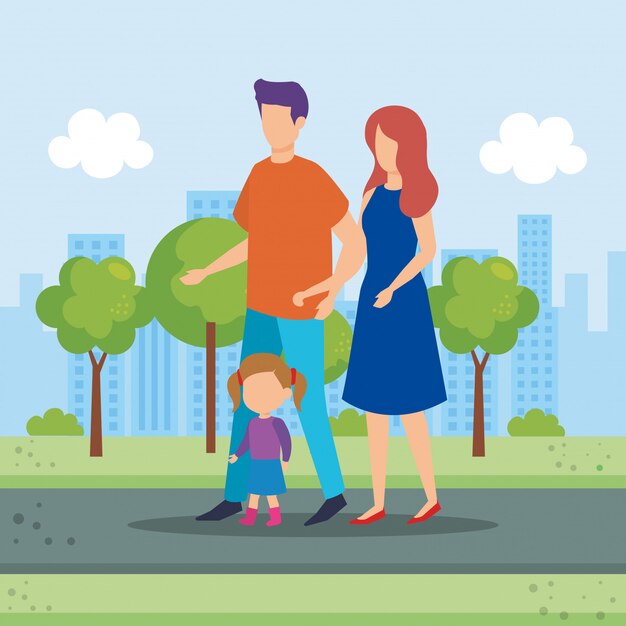 Pareja de padres con hija en el parque