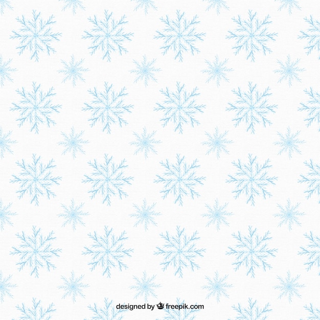 Patrón dibujado a mano con copos de nieve azules