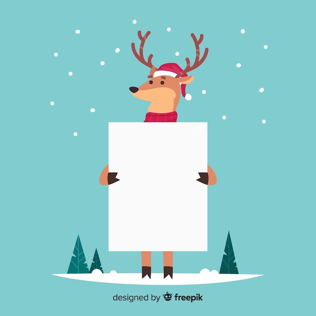 Personaje de navidad con una tarjeta de navidad