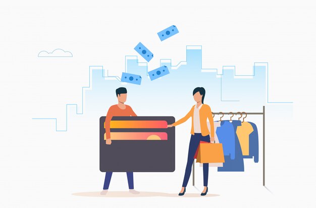 Personas comprando ropa con tarjeta de crédito.