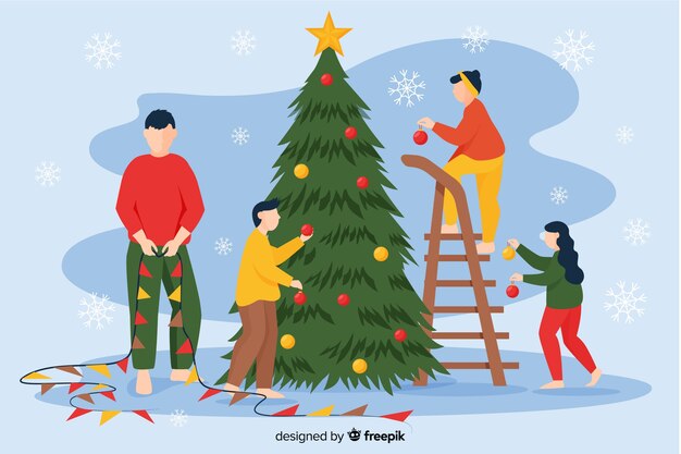 Personas decorando el fondo de la temporada de invierno del árbol