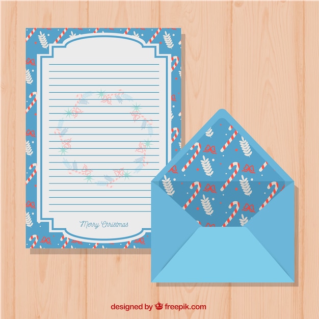 Plantilla azul de una carta de navidad y un sobre
