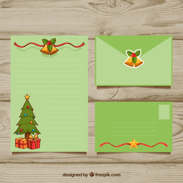 Plantilla de carta y sobre navideños verdes con un árbol de navidad