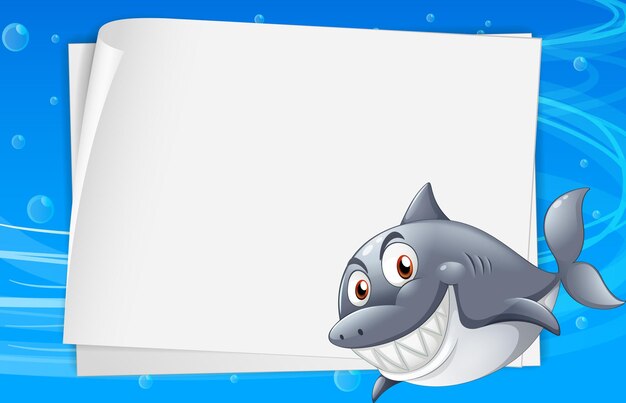 Plantilla de papel en blanco con un personaje de dibujos animados de tiburón en la escena submarina