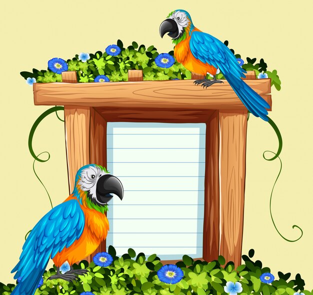 Plantilla de papel con dos pájaros macaw