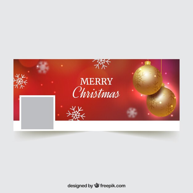 Portada roja de facebook para navidad con una chuchería dorada