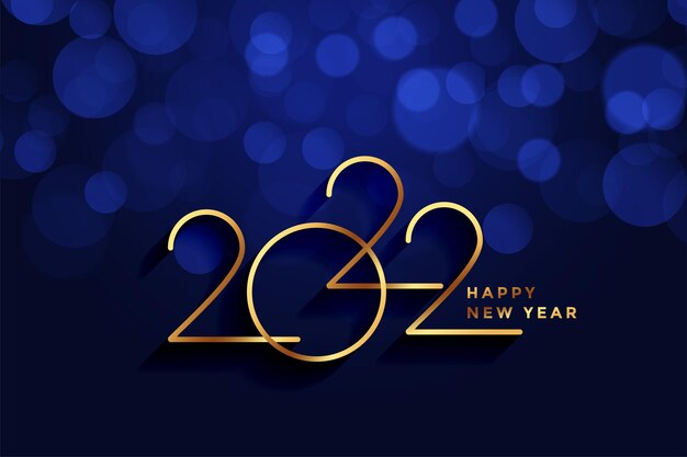 Premium feliz año nuevo saludo azul real y dorado sobre fondo bokeh