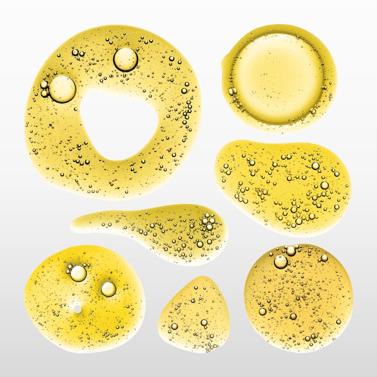 Vector gratuito resumen macro de burbuja de aceite amarillo tiro vector líquido oro