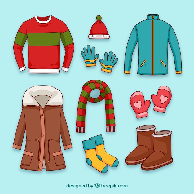 Ropa de invierno dibujada a mano y elementos esenciales