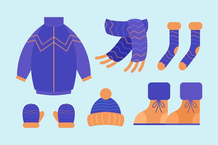 Vector gratuito ropa de invierno de diseño plano y básicos.