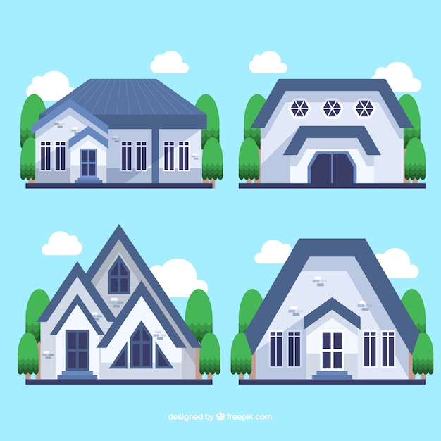 Set de cuatro casas con tejado azul