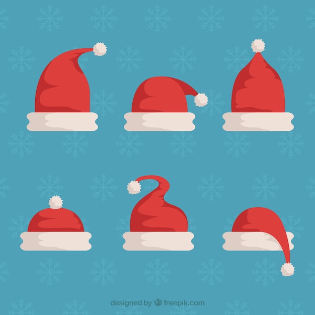 Set de gorros de santa claus en diseño plano