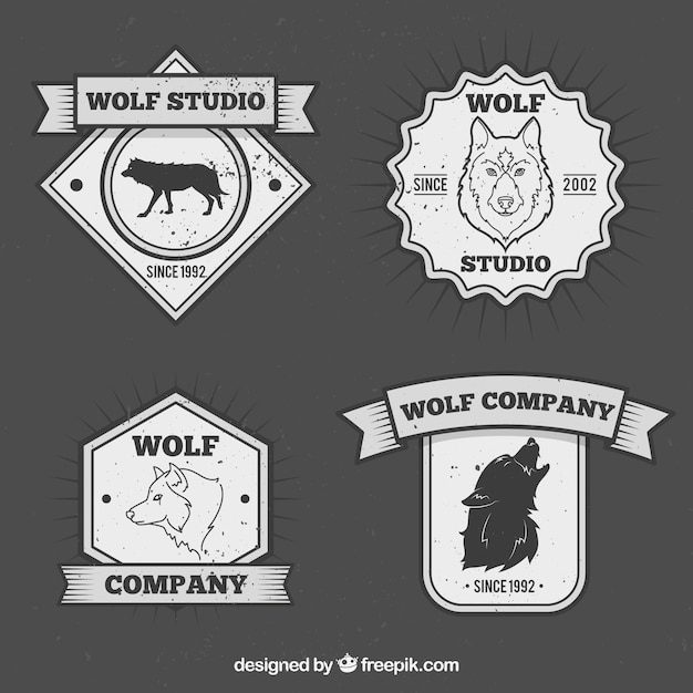 Vector gratuito set de insignias vintage de lobos