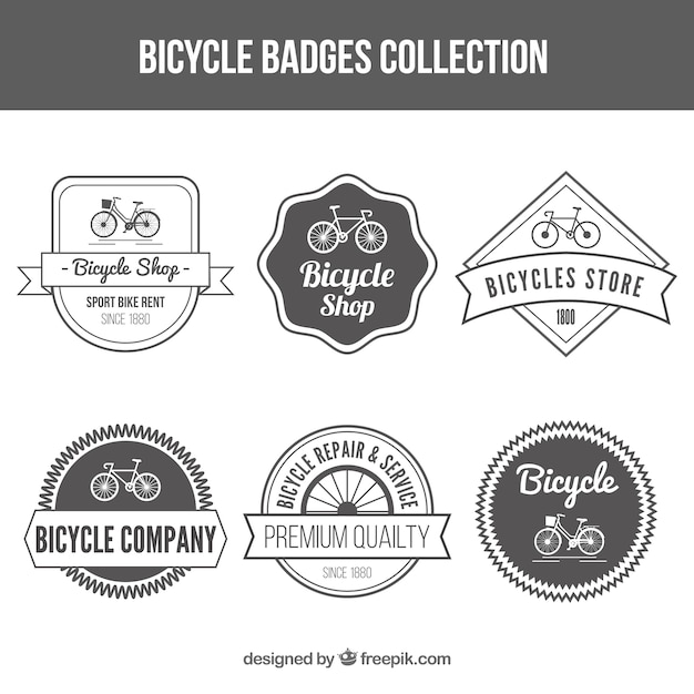 Vector gratuito set de insignias vintage de tienda de bicicletas