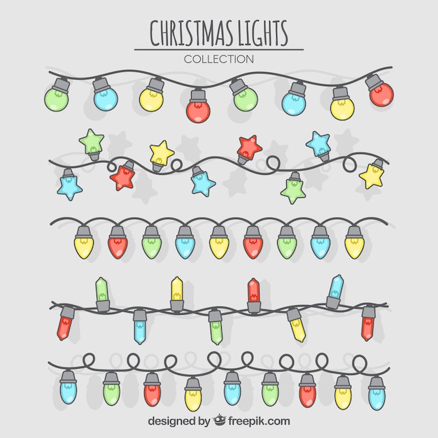 Vector gratuito set de luces navideñas de colores dibujadas a mano