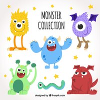 Vector gratis set de monstruos graciosos en estilo hecho a mano