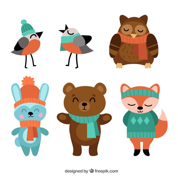 Set de pájaros y simpáticos animales del bosque con ropa de invierno 