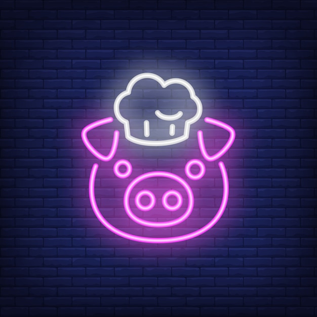 Sonriente cerdo con sombrero de chef. elemento de signo de neón anuncio brillante de la noche.
