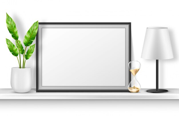 Soporte de marco de fotos vacío en estante blanco con planta