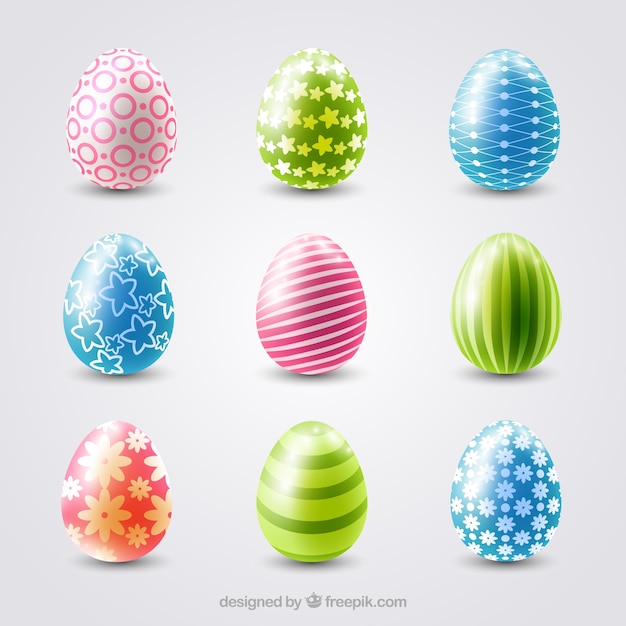 Surtido de huevos de pascua realistas con diseños coloridos