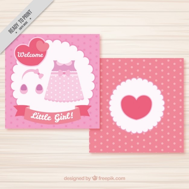 Tarjeta de baby shower con vestido rosa