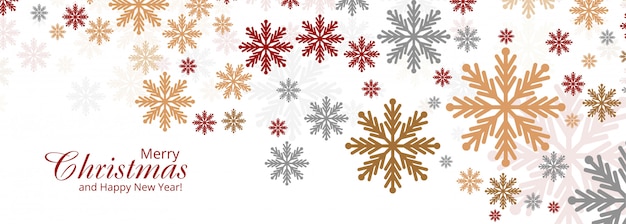 Tarjeta colorida abstracta de los copos de nieve de la Navidad