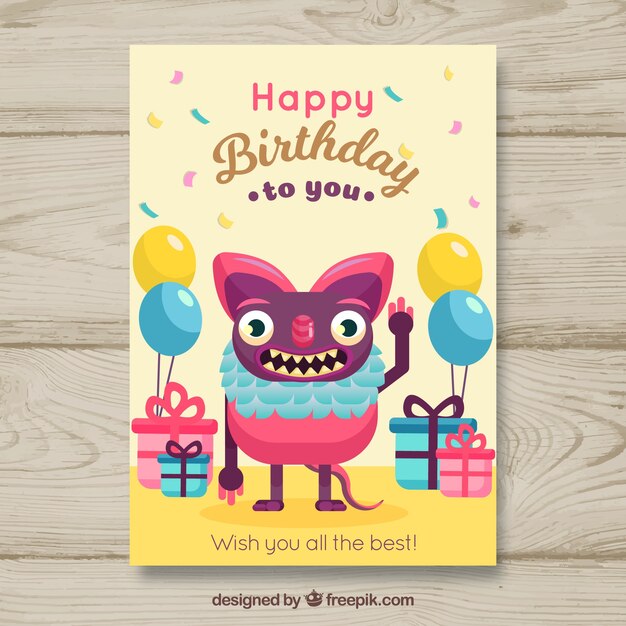 Tarjeta de cumpleaños con monstruo divertido en estilo plano