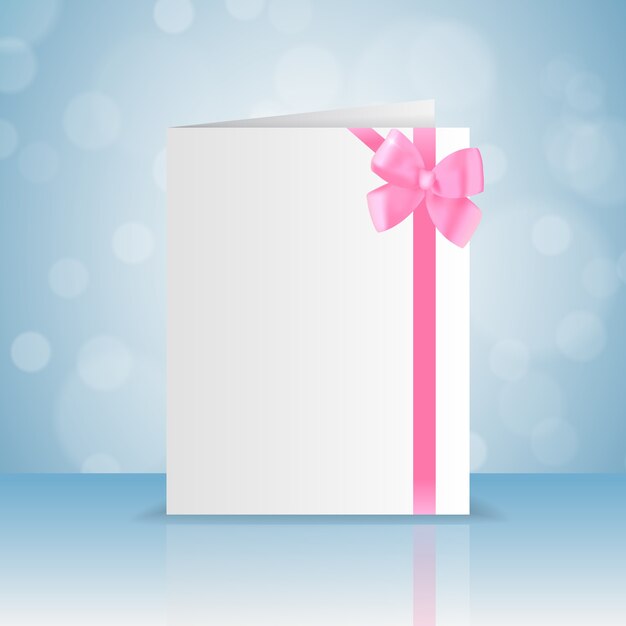 Tarjeta de felicitación blanca en blanco con lazo rosa romántico y cinta con bokeh plano