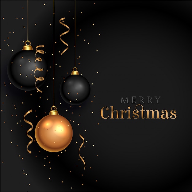 Tarjeta de felicitación de feliz navidad negra con bolas decorativas realistas