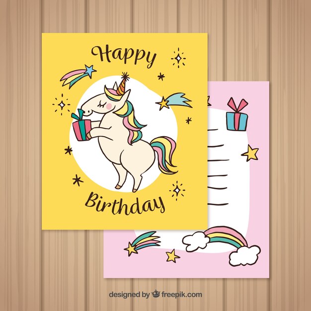 Tarjeta de felicitación con unicornio dibujado a mano