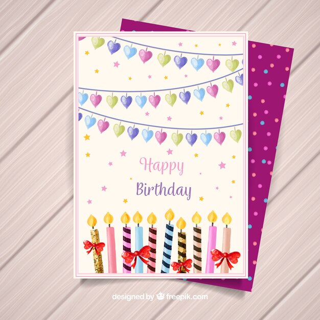 Tarjeta de feliz cumpleaños con globos y velas en estilo acuarela