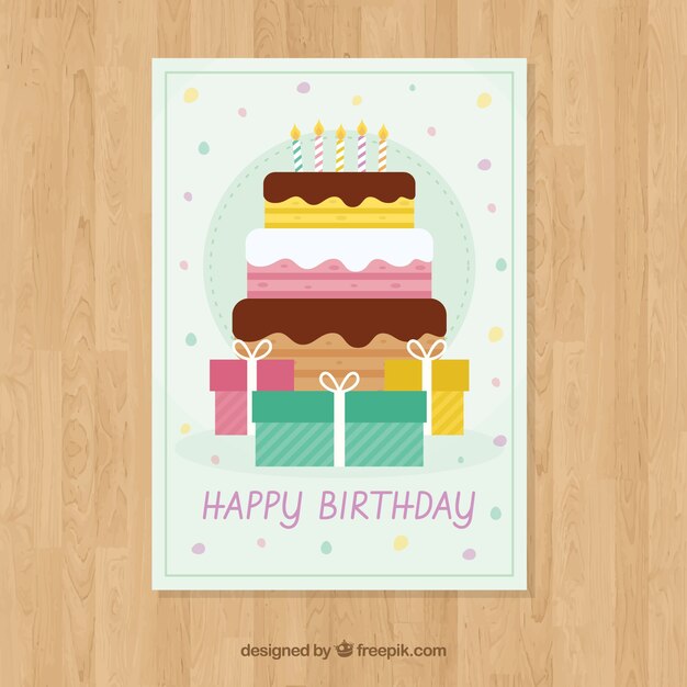 Tarjeta de feliz cumpleaños con tarta y regalos